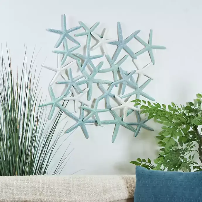 Kirklands Home Light Blue Metal Overlapping Starfish Wall Plaque