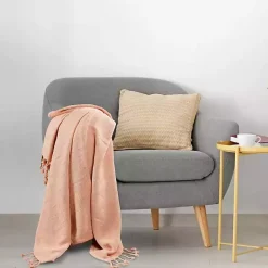 Kirklands Home Peach Checkered Weave Fringe Throw Pink