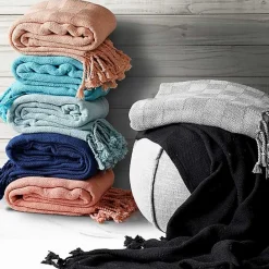 Kirklands Home Peach Checkered Weave Fringe Throw Pink