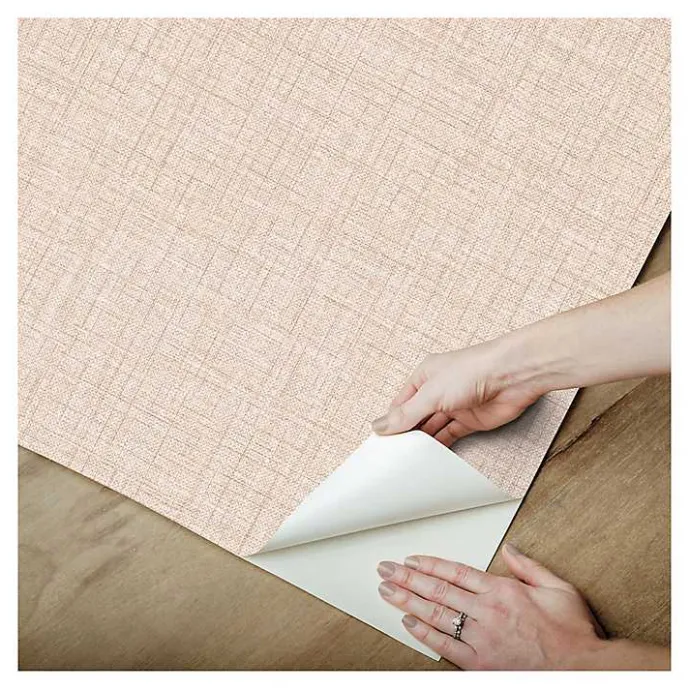 New Kirklands Home Peach Textured Faux Fabric Peel & Stick Wallpaper