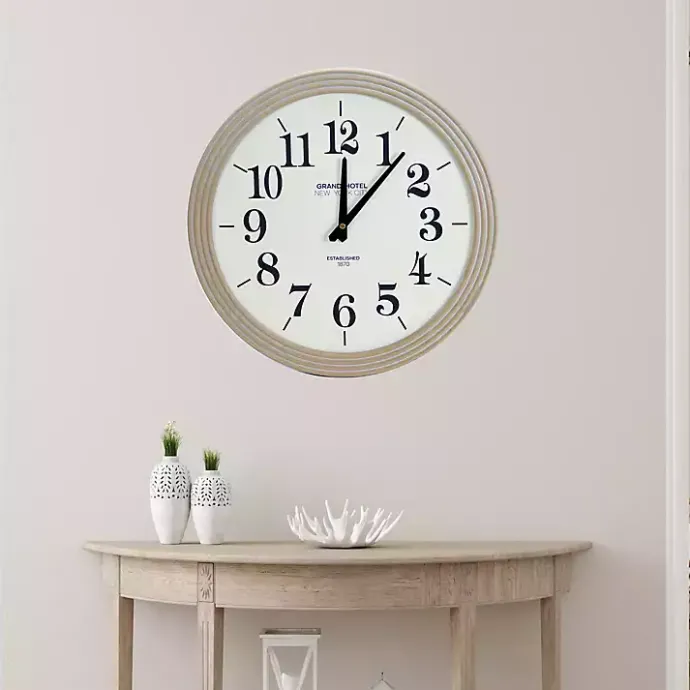 Discount Kirklands Home Round Natural Reed Frame Wall Clock