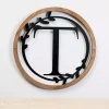 Kirklands Home Wood and Metal Laurel Monogram T Plaque